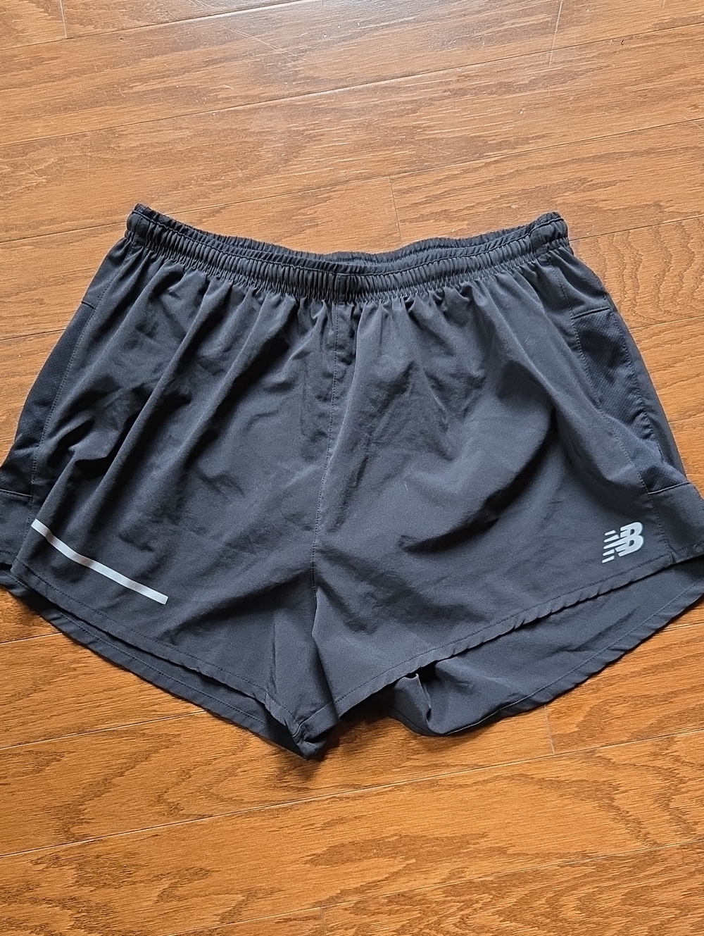 New Balance Men's Black Athletic Running Shorts with Reflective Detail